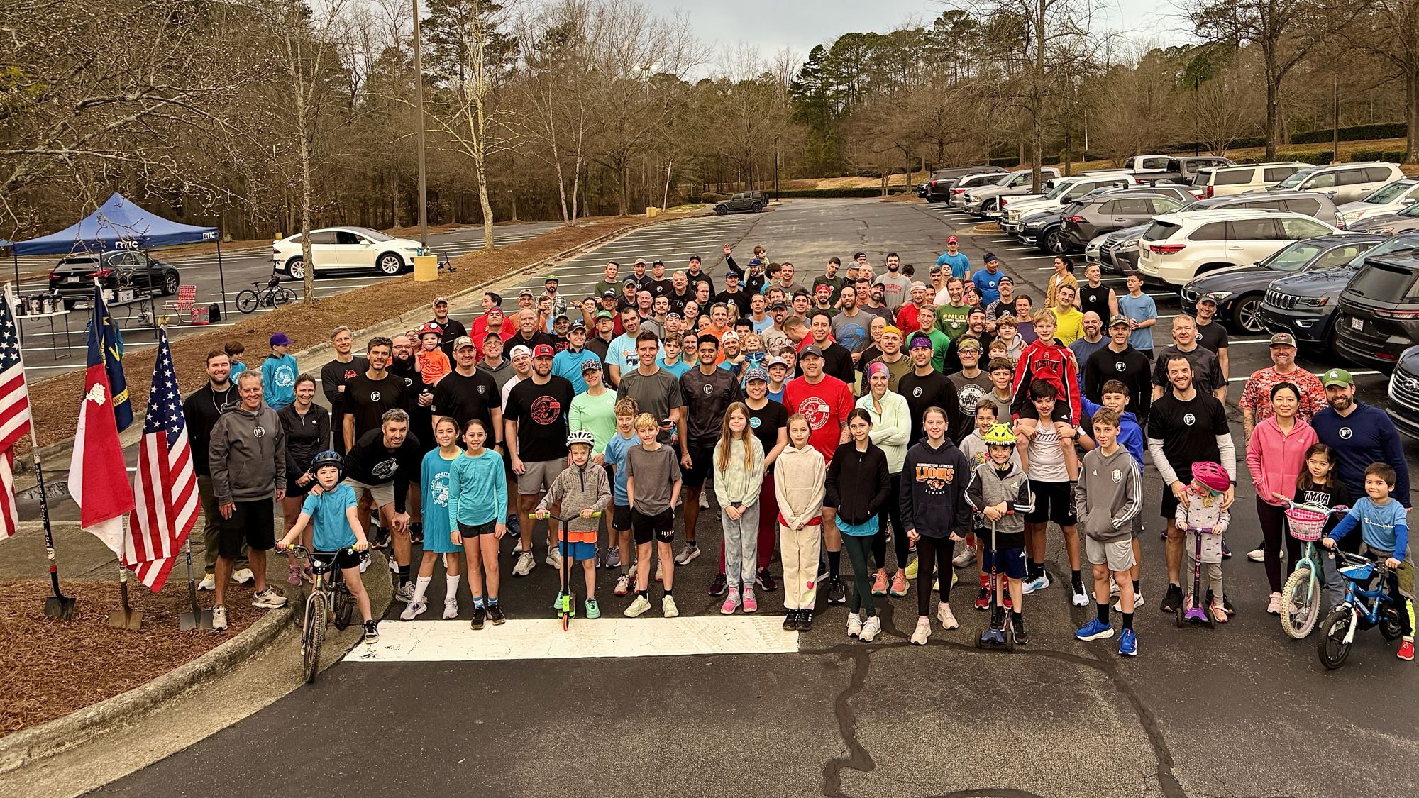 Group photo of well over a hundred F3 men, families, and kids at the Duck Donuts Dash